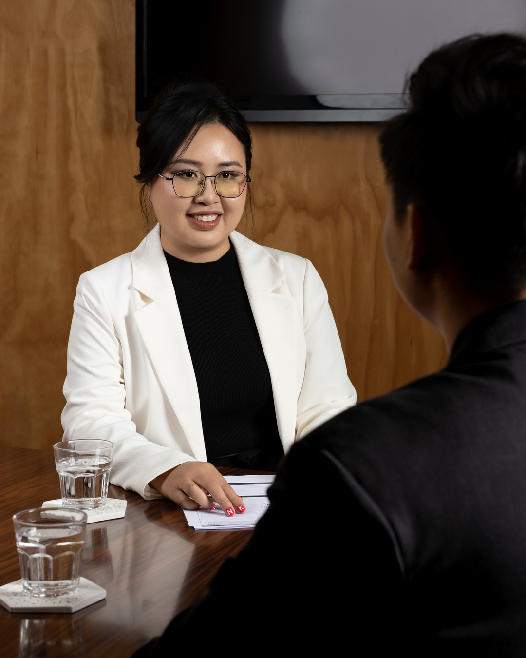 Huong Bui in a client meeting